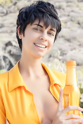 Kensi Dressed In A Bold Orange Crop Top That Hugs Her Perfect Breasts And A Matching Mini Skirt