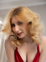 Minnie Lighter Teases On The Couch With Seductive Lingerie And Alluring Curves - Photo 02