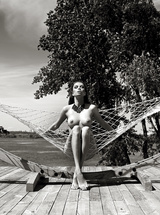 Ukrainian model Svitlana Chumachenko pose poolside