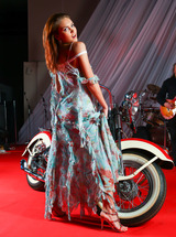 Cristina In Performance In Front Of The Motorcycle