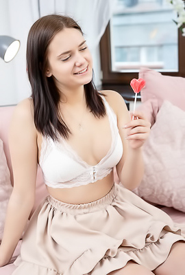 Tina Howl Flirty Look In Her Gorgeous Blue Eyes As She Sucks Her Lollipop