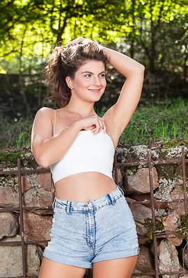 Kassie Performs Out Doorway Striptease In Denim Shorts With Perky Nipples