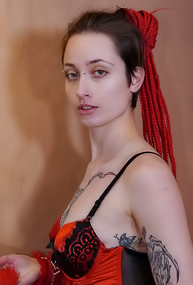 Alena Teases And Pleasures Herself With Striking Ink, Cuffs, And Bold Toy Play