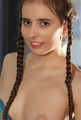 Carla Cruzz Whips Off Pigtails, An Explosive Couch Striptease Unleashed